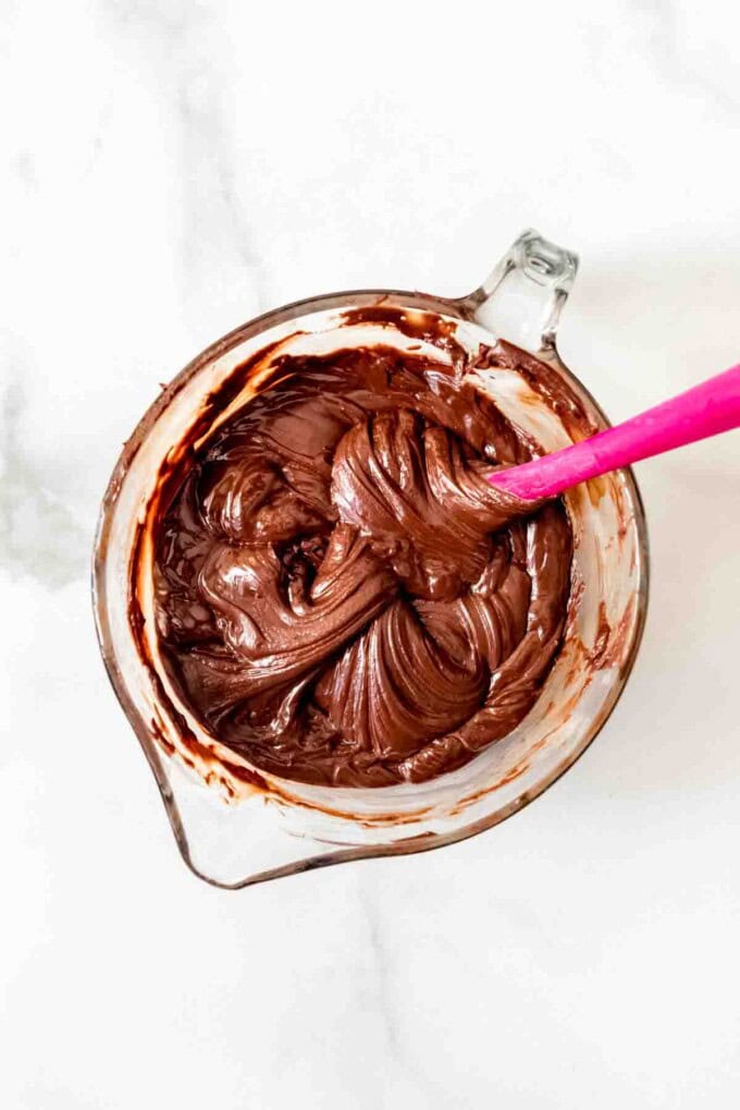 Melted chocolate fudge mixture in a mixing bowl.