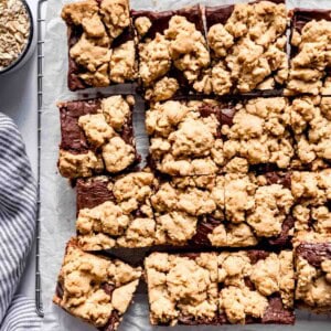 An image of easy oatmeal cookie bars on a wire cooling rack.