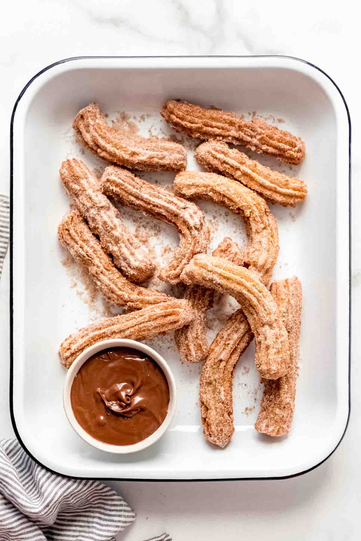 An image of a tray of homemade copycat Disneyland churros.