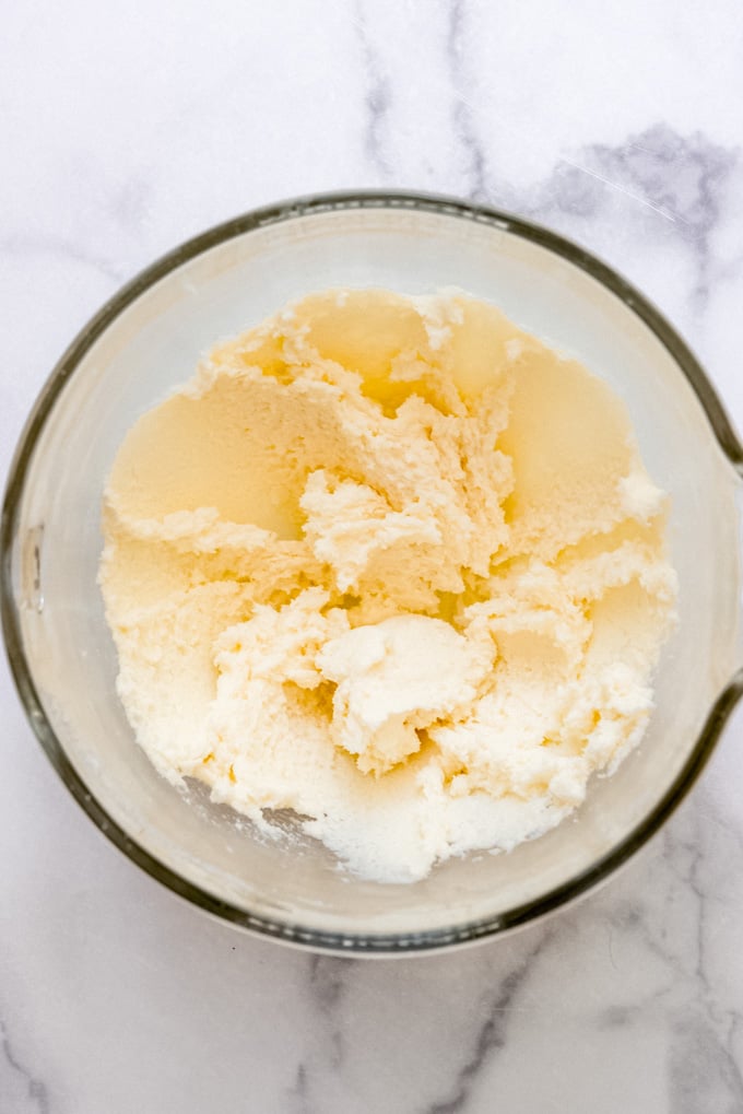 butter and sugar creamed together in a glass bowl
