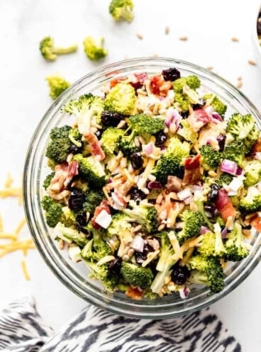 An aerial view of a bowl filled with broccoli salad