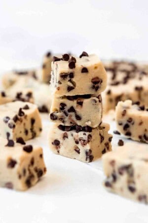 A stack of pieces of homemade cookie dough fudge.