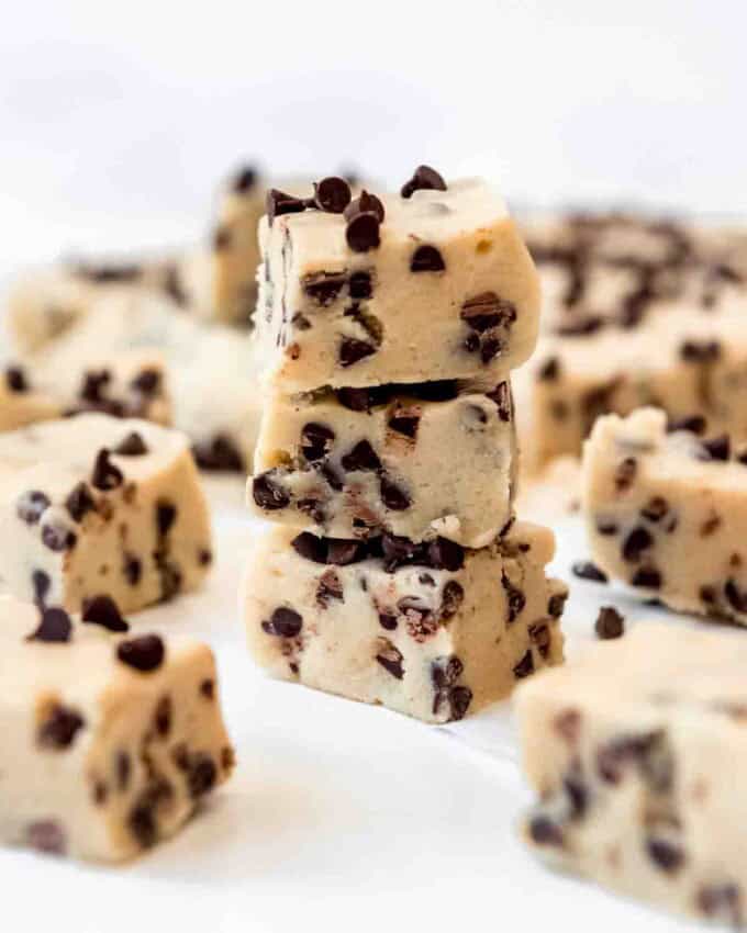 A stack of pieces of homemade cookie dough fudge.