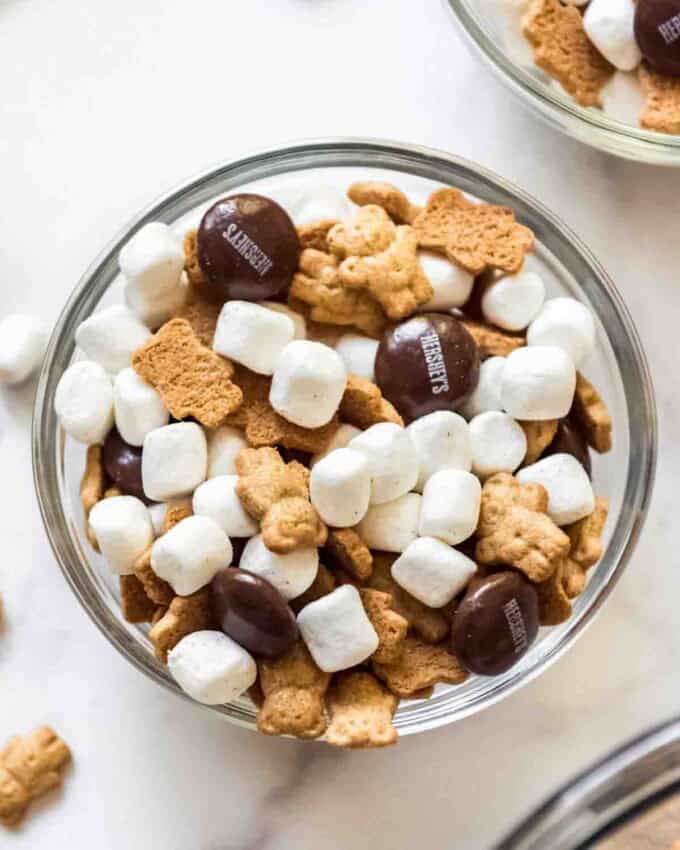 A close up image of a bowl of s'mores snack mix.