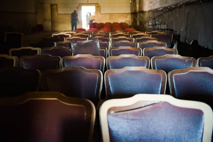 Run-down movie theater seats.