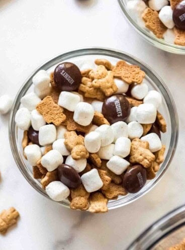 A close up image of a bowl of s'mores snack mix.