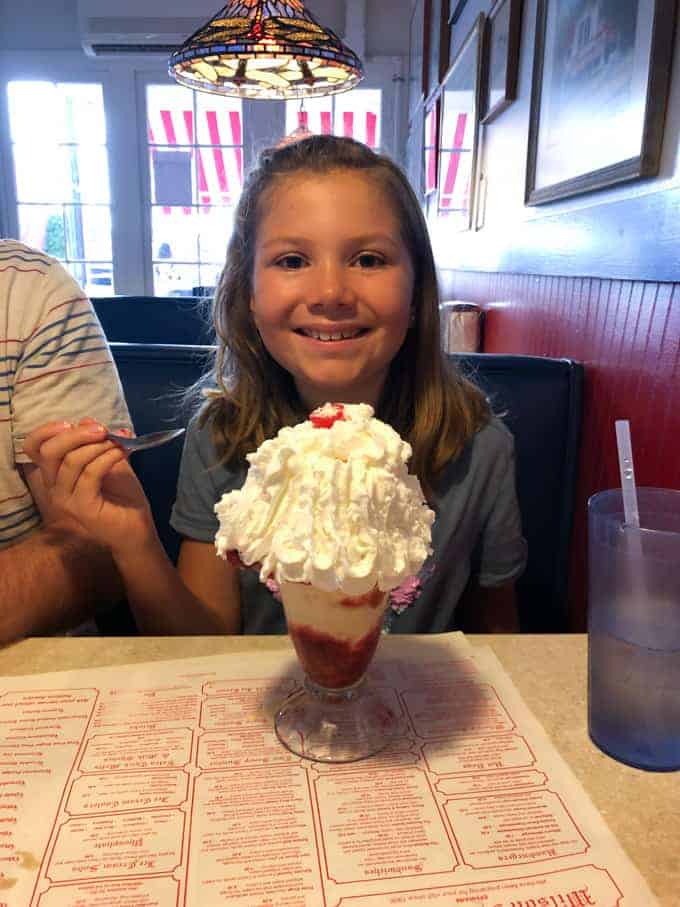 A child enjoying an ice cream sundae at Wilson's restaurant in Ephraim, Wisconsin.