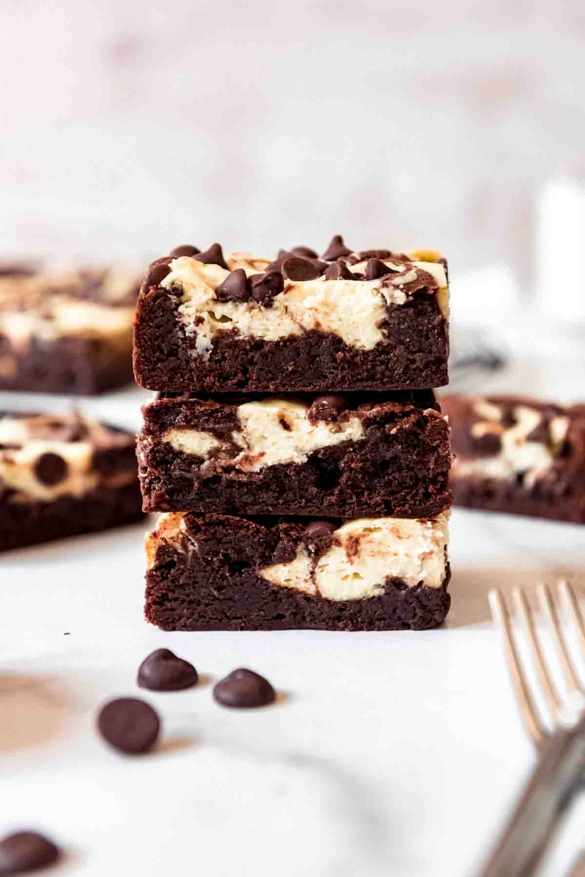 Stacked cream cheese brownies.