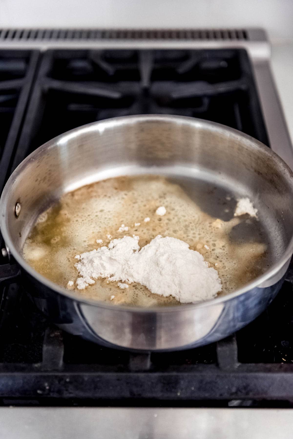 Butter and flour in a pan for a roux.
