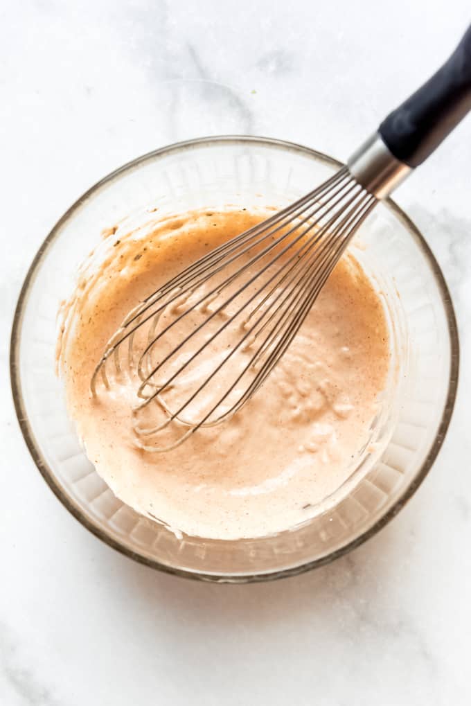 Blooming Onion Sauce mixed together in a large bowl with a whisk.