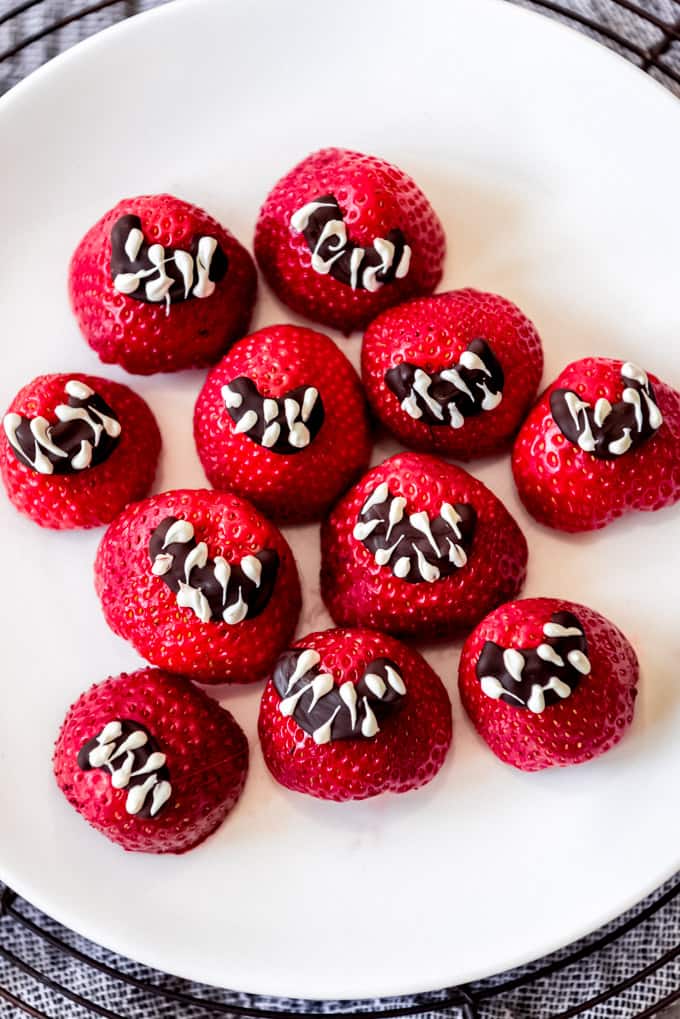 Strawberry mouths on a plate.