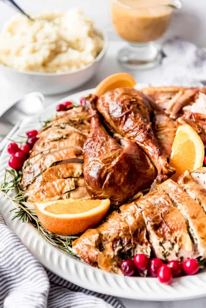 Carved turkey meat on a platter.
