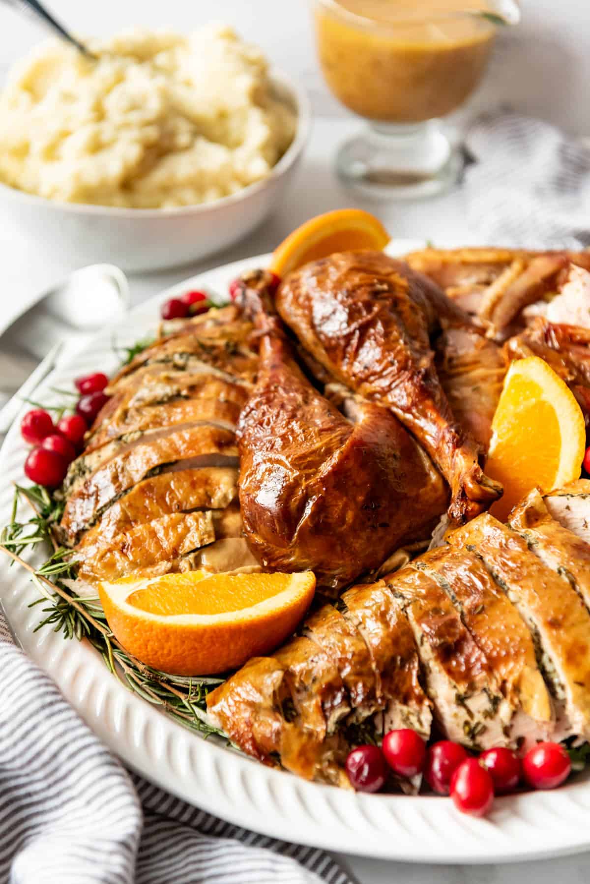 Carved turkey meat on a platter.