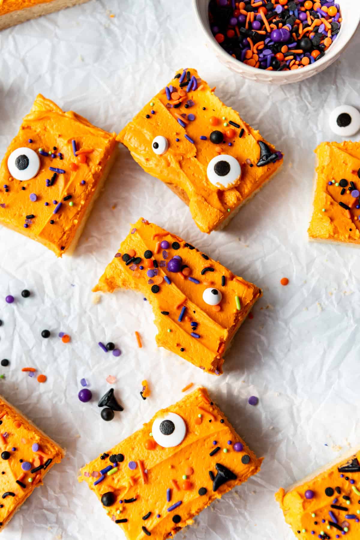 Image of sugar cookie bar with orange frosting