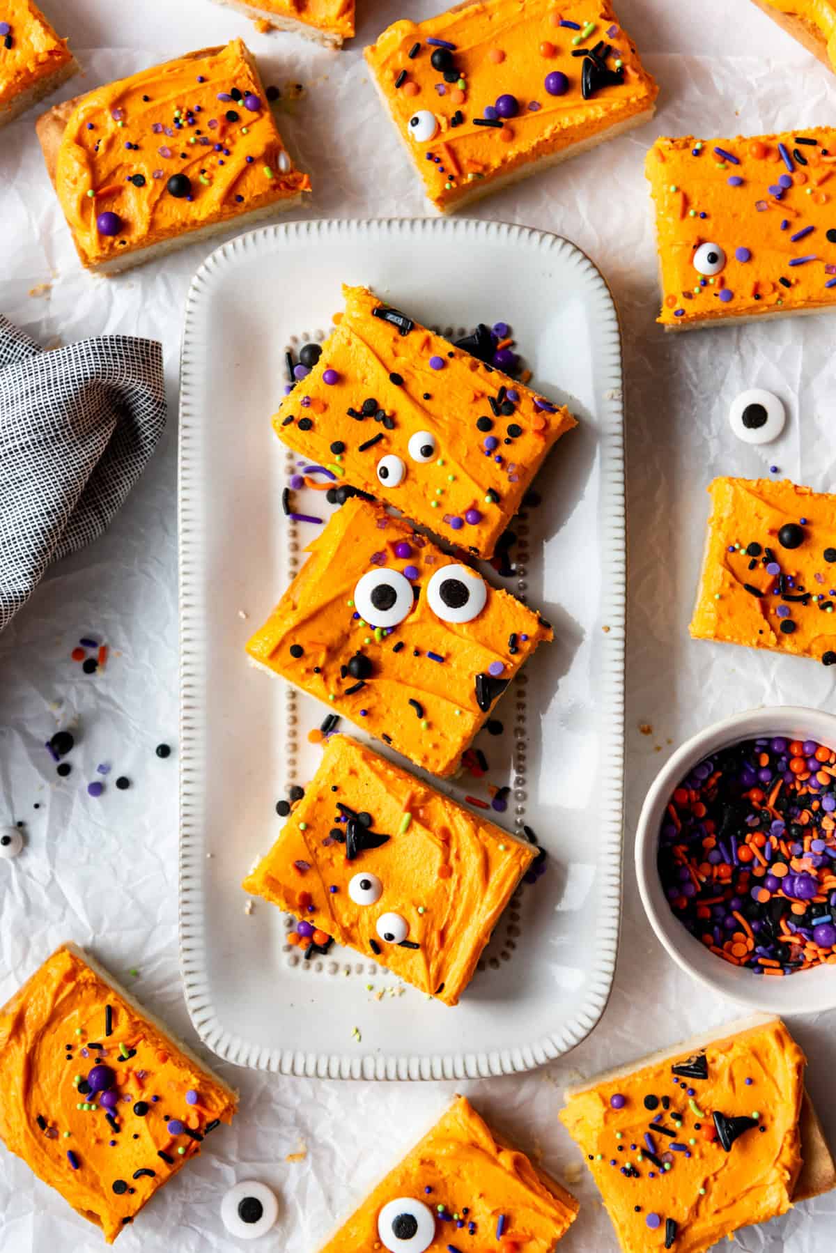 Sugar cookie bars with orange frosting.