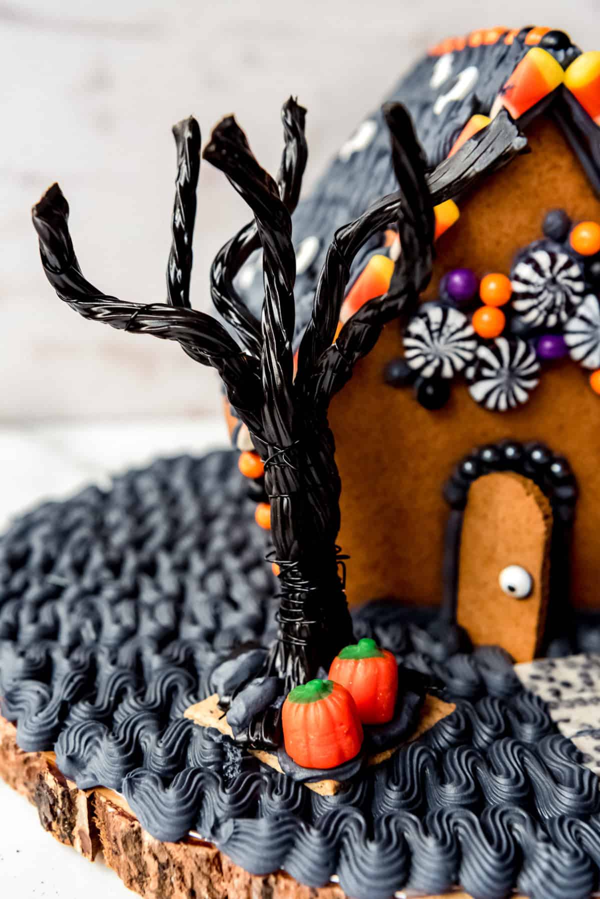 A spooky tree made from black licorice and wire.