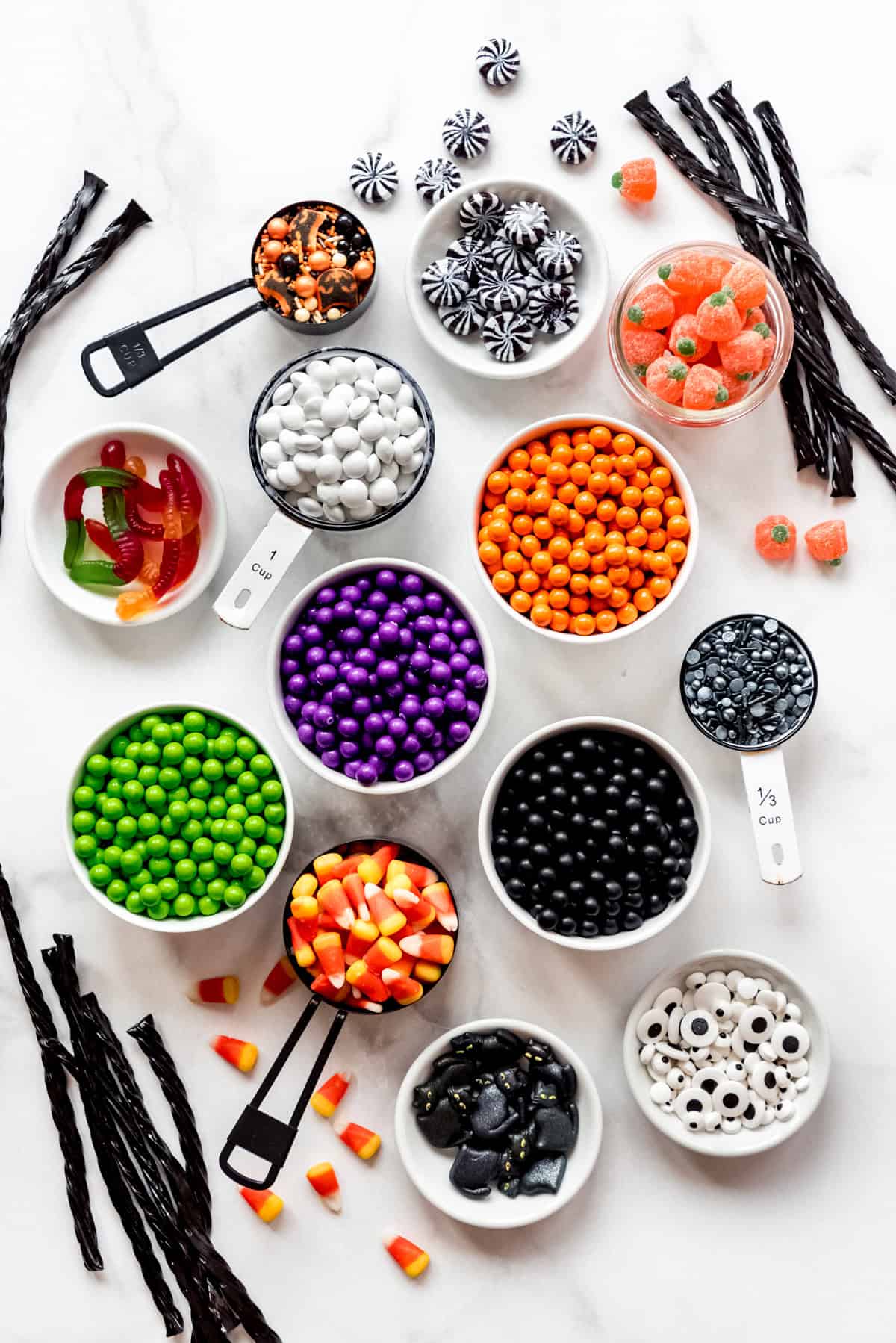 Bowls of candy for decorating Halloween gingerbread houses.