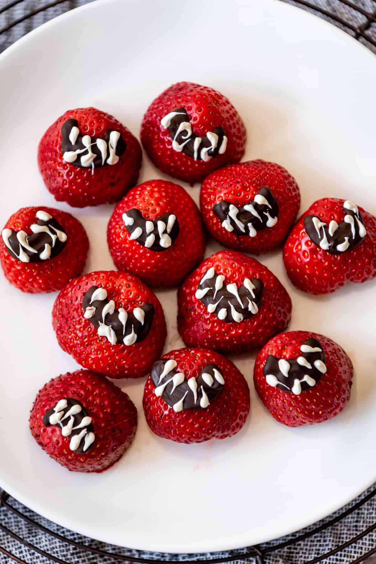 Strawberry mouths on a plate.