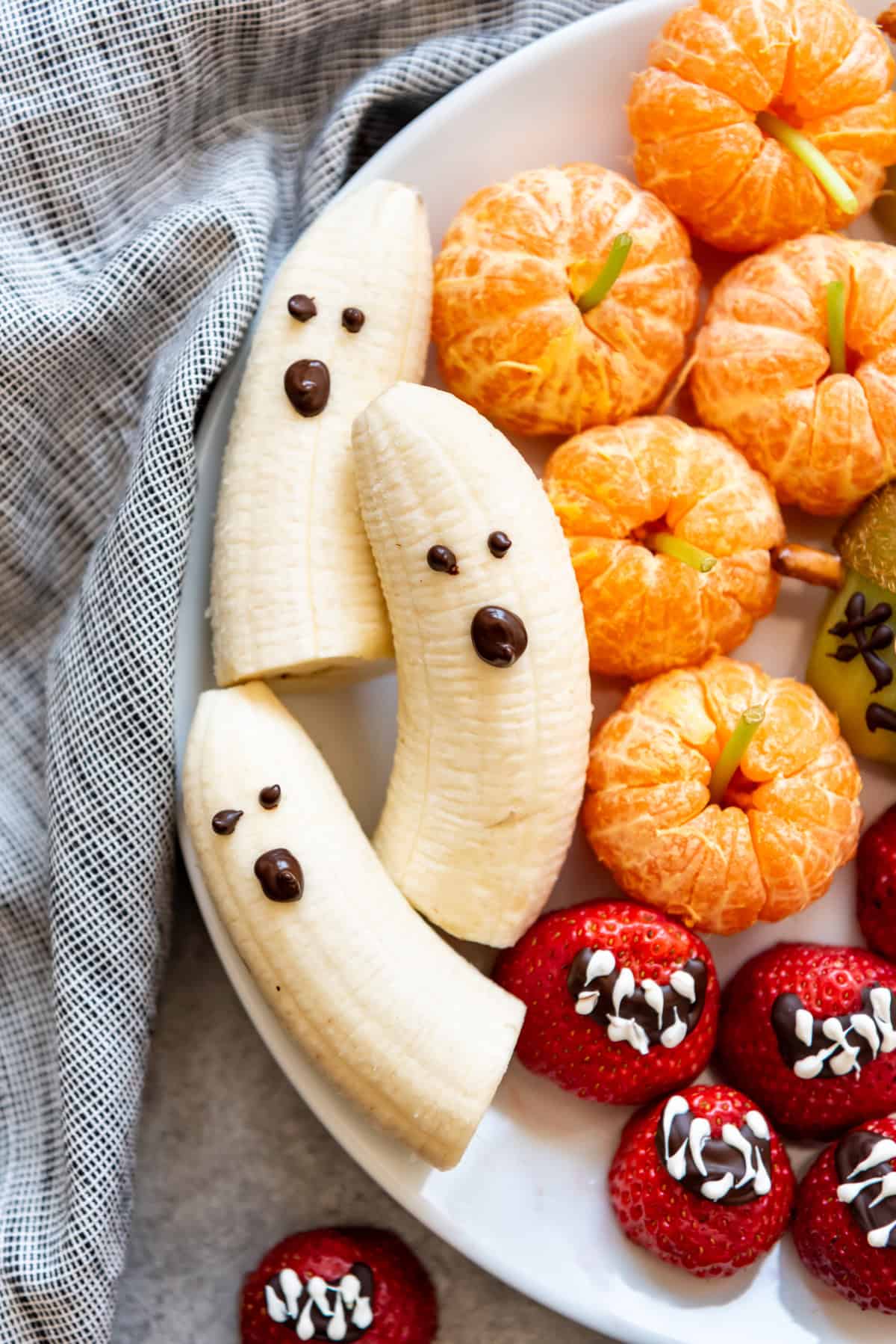 Bananas decorated as ghosts.