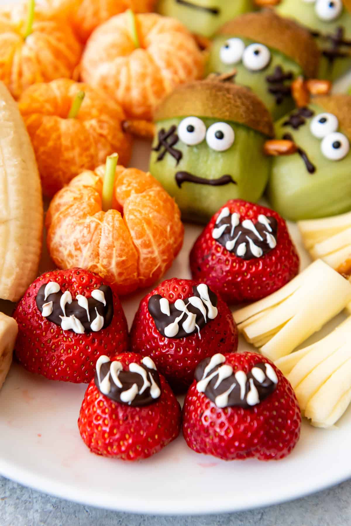 Fruit decorated for Halloween snacks.