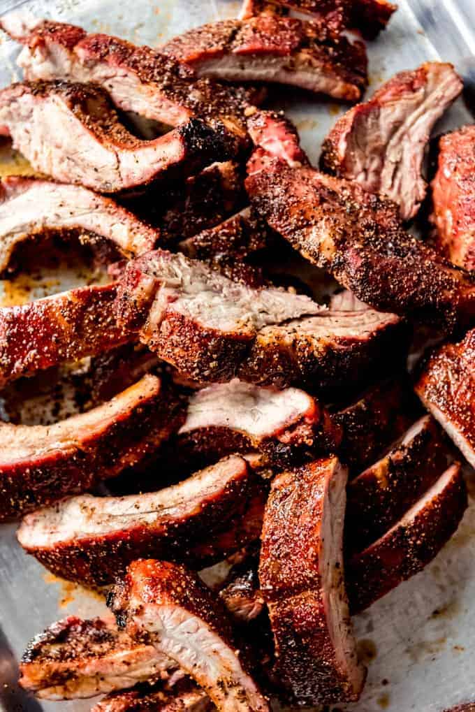 Piles of meaty smoked pork ribs.
