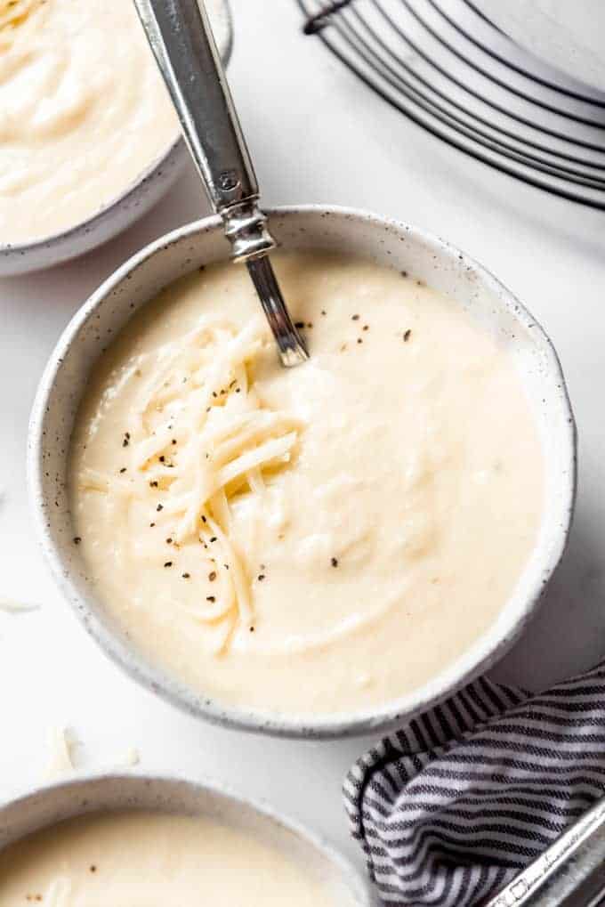 wisconsin cauliflower soup garnished with cheese