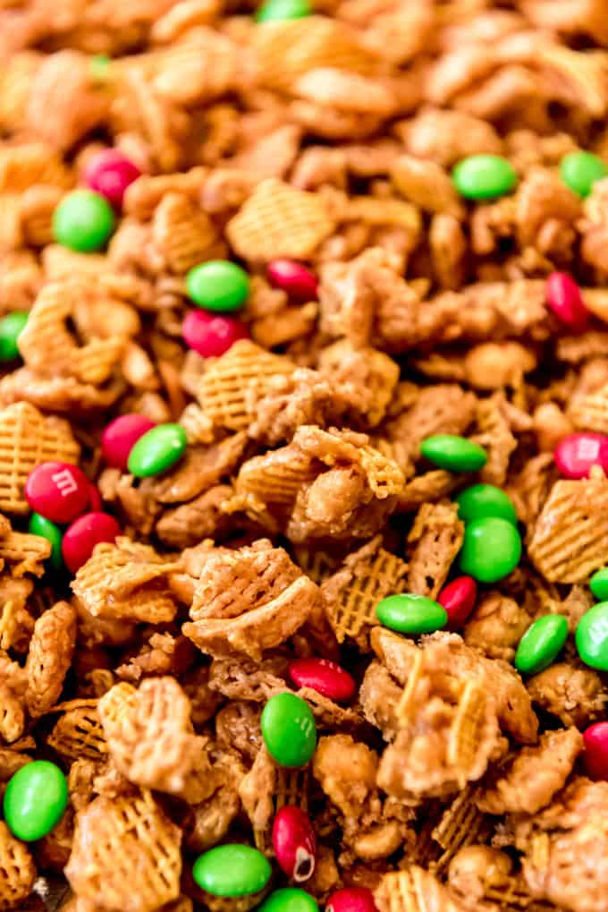 A close image of crispix mix with peanuts and chocolate candies