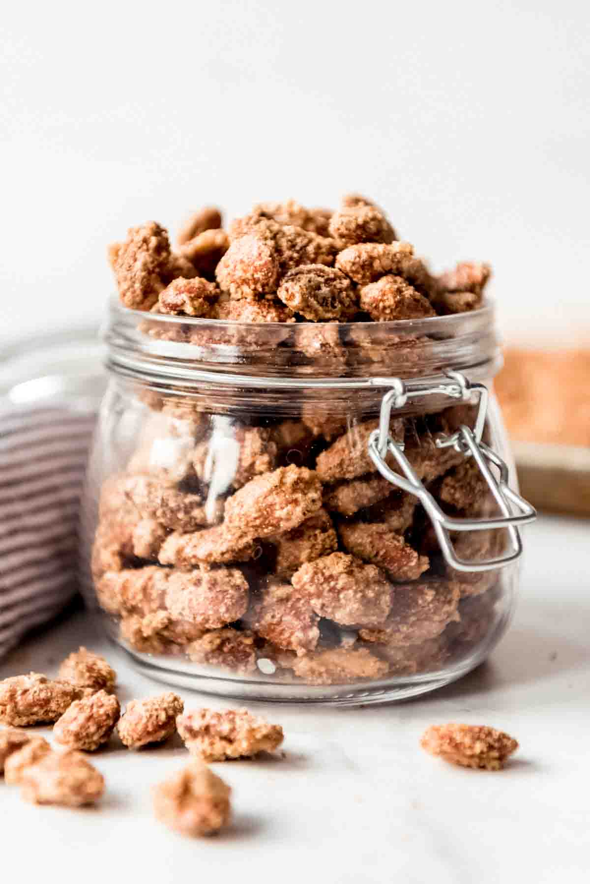 Sugared almonds in a glass jar.