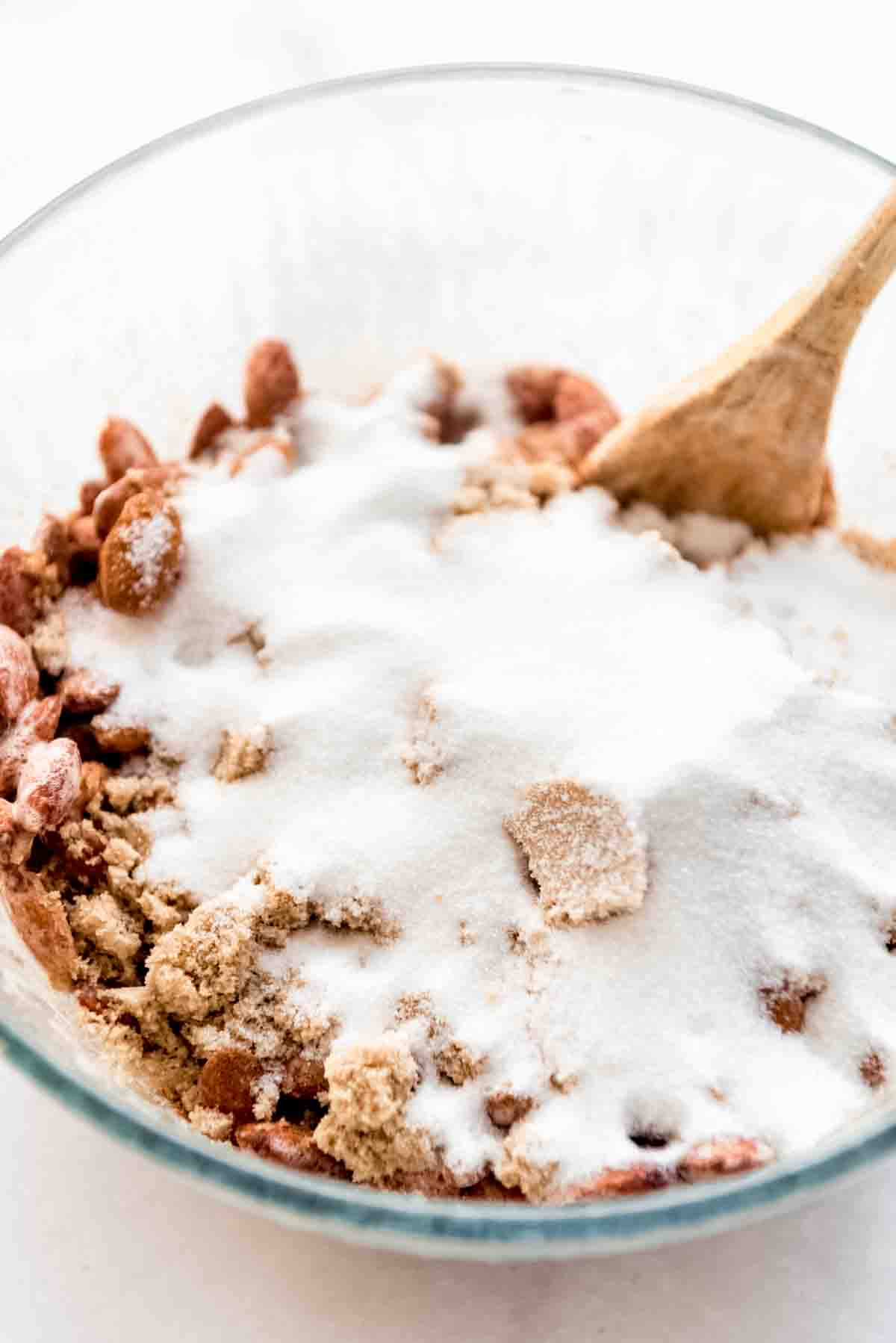 Cinnamon and sugar are added to the almond mixture. 