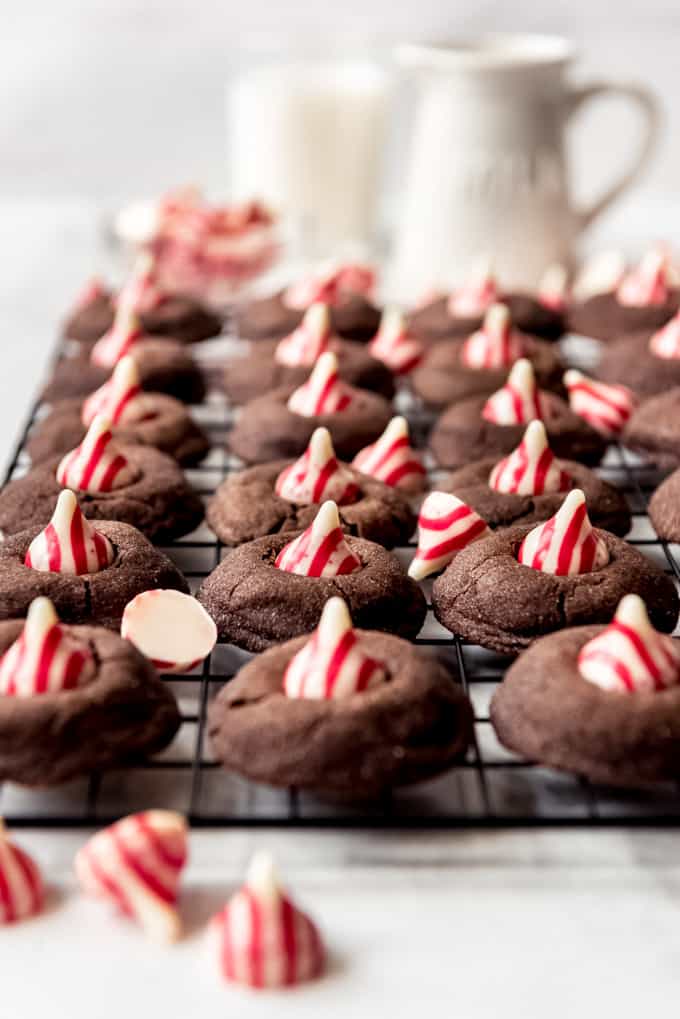 Soft chocolate peppermint blossoms on a cooling rack.