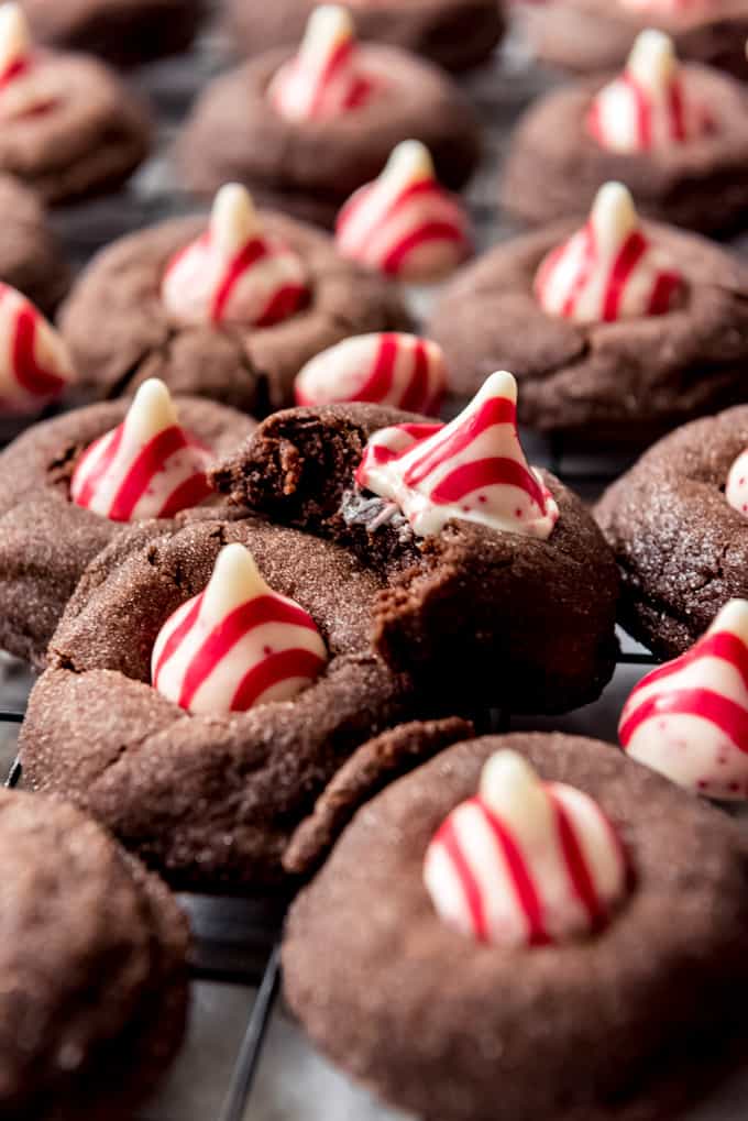 A melting Hershey's candy cane kiss on chocolate cookies.