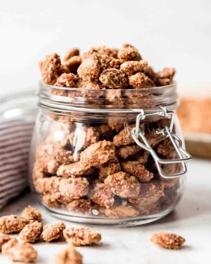 Sugared almonds in a glass jar.