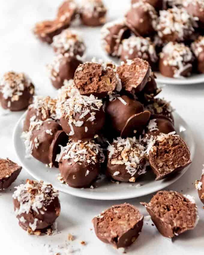 German Chocolate Cake Balls on a white plate.