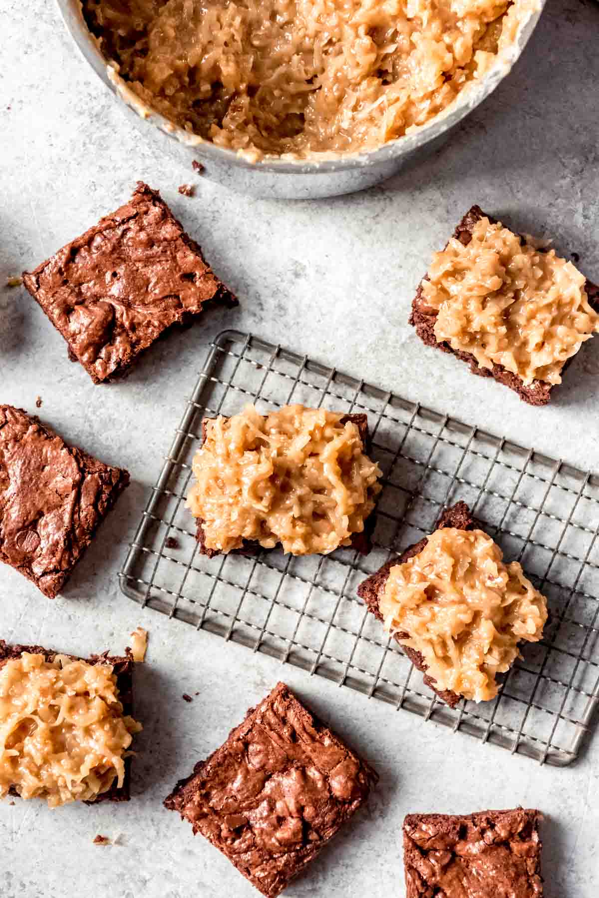 An overhead image of brownies with german chocolate frosting.