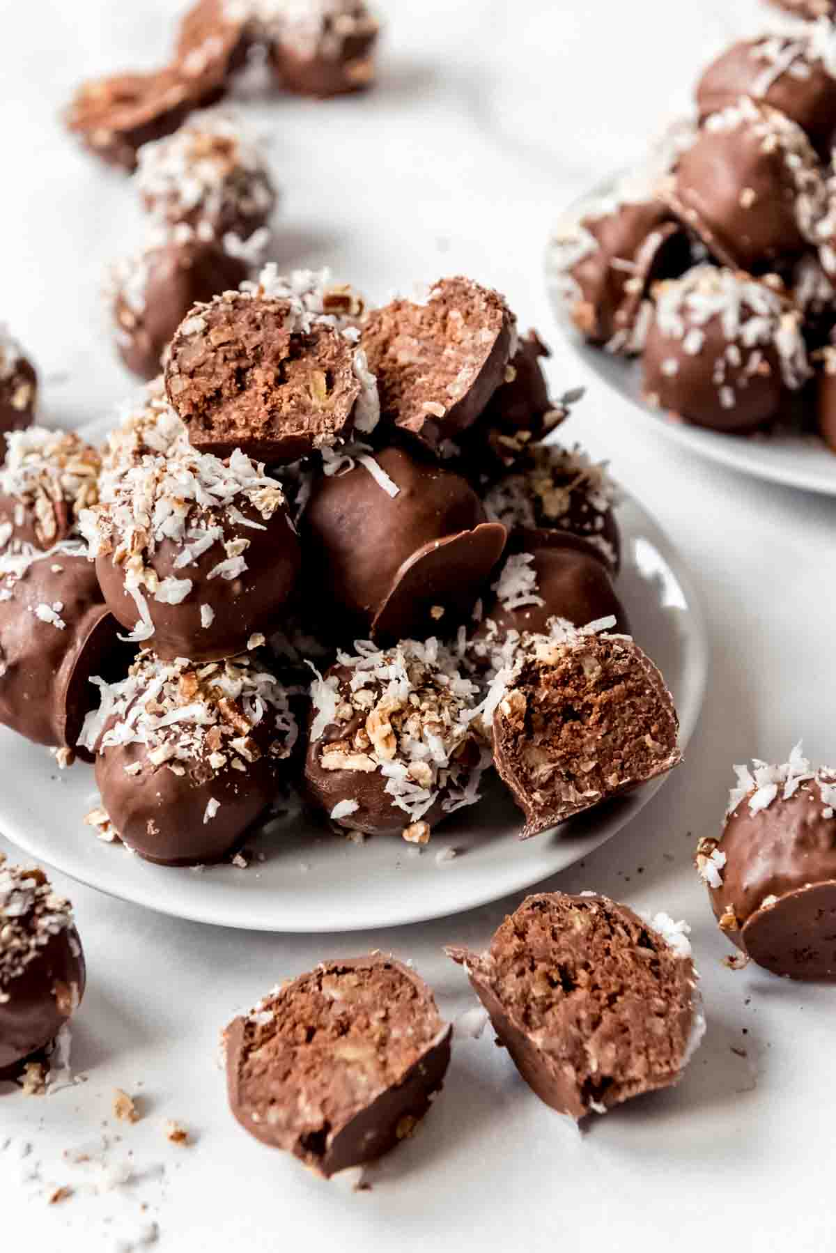 German Chocolate Cake Balls on a white plate.