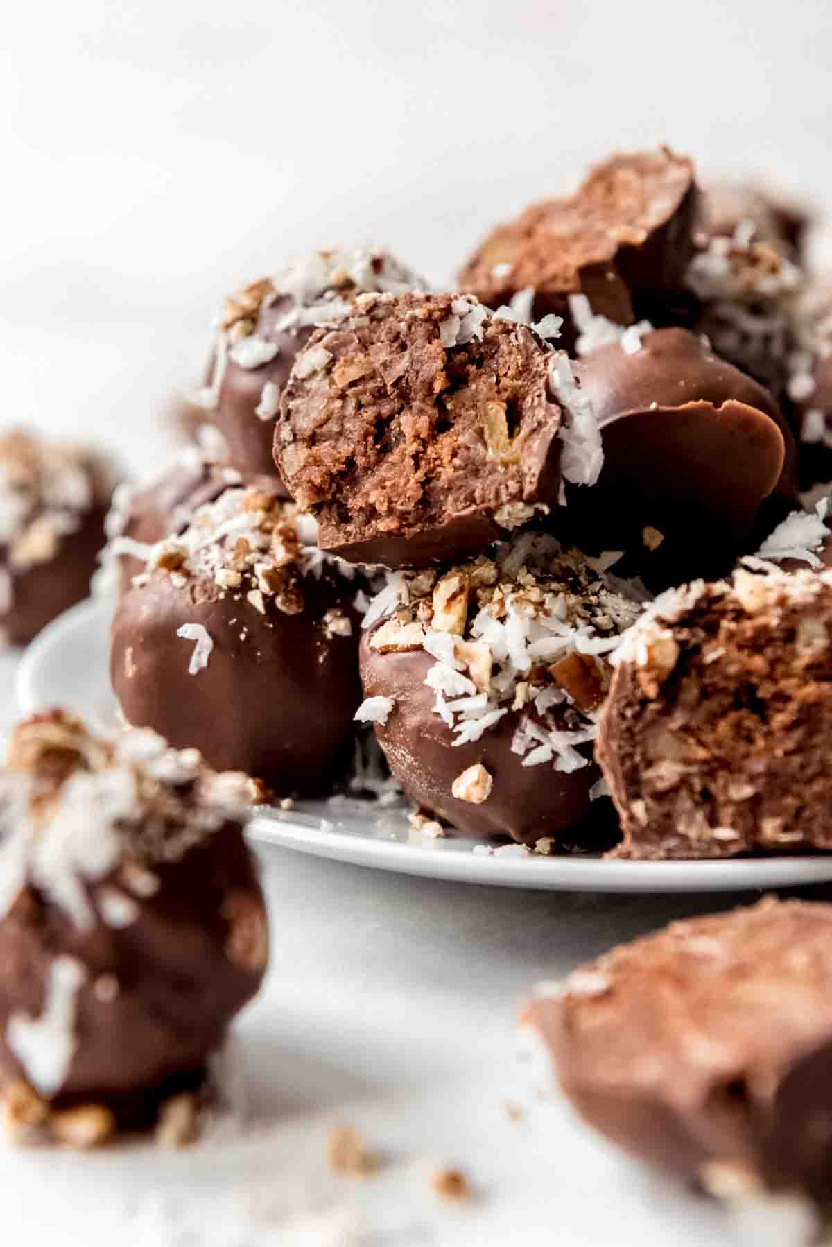 German chocolate cake truffles piled on a plate.