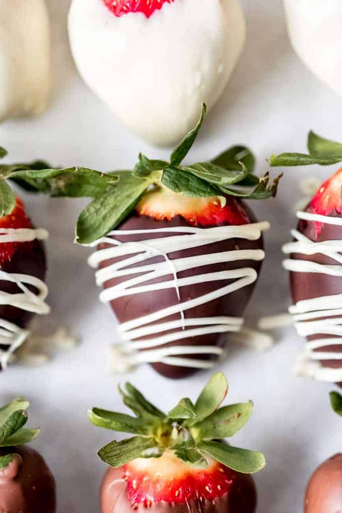 Strawberries covered in dark and white chocolate.