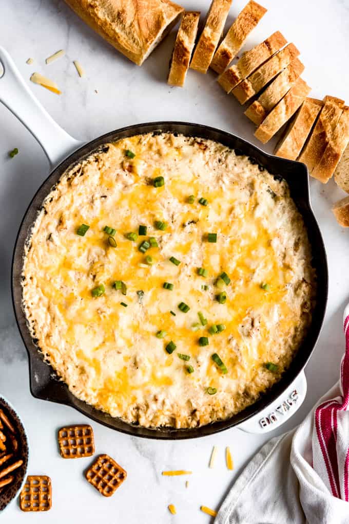 a cast iron skillet filled with Maryland hot crab dip