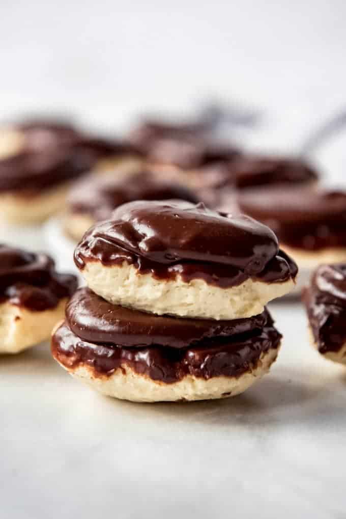 two chocolate covered berger cookies stacked on top of each other