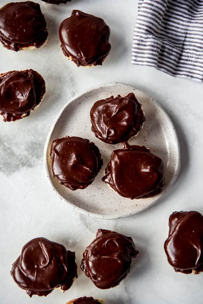 chocolate covered berger cookies on a plate