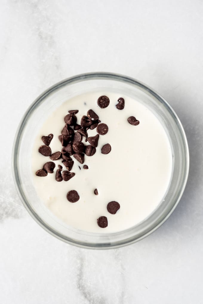 chocolate chips melting in hot cream