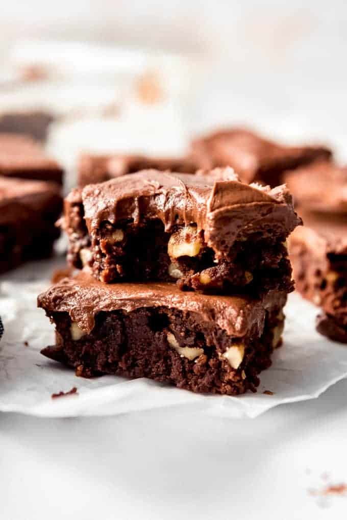 stacked brownies with chocolate frosting