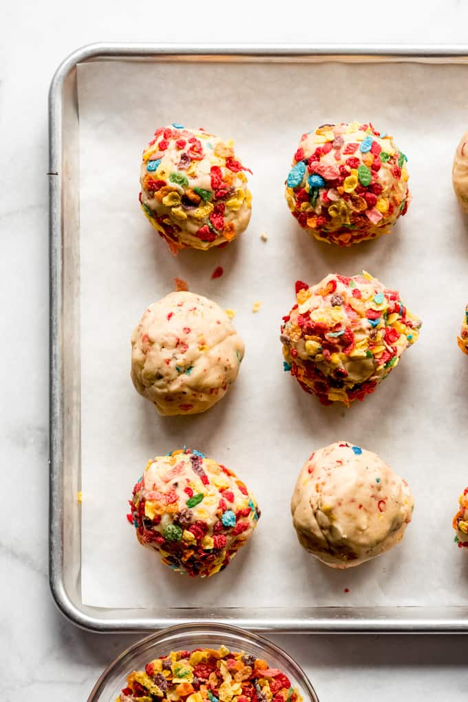 Balls of cookie dough on a baking sheet.