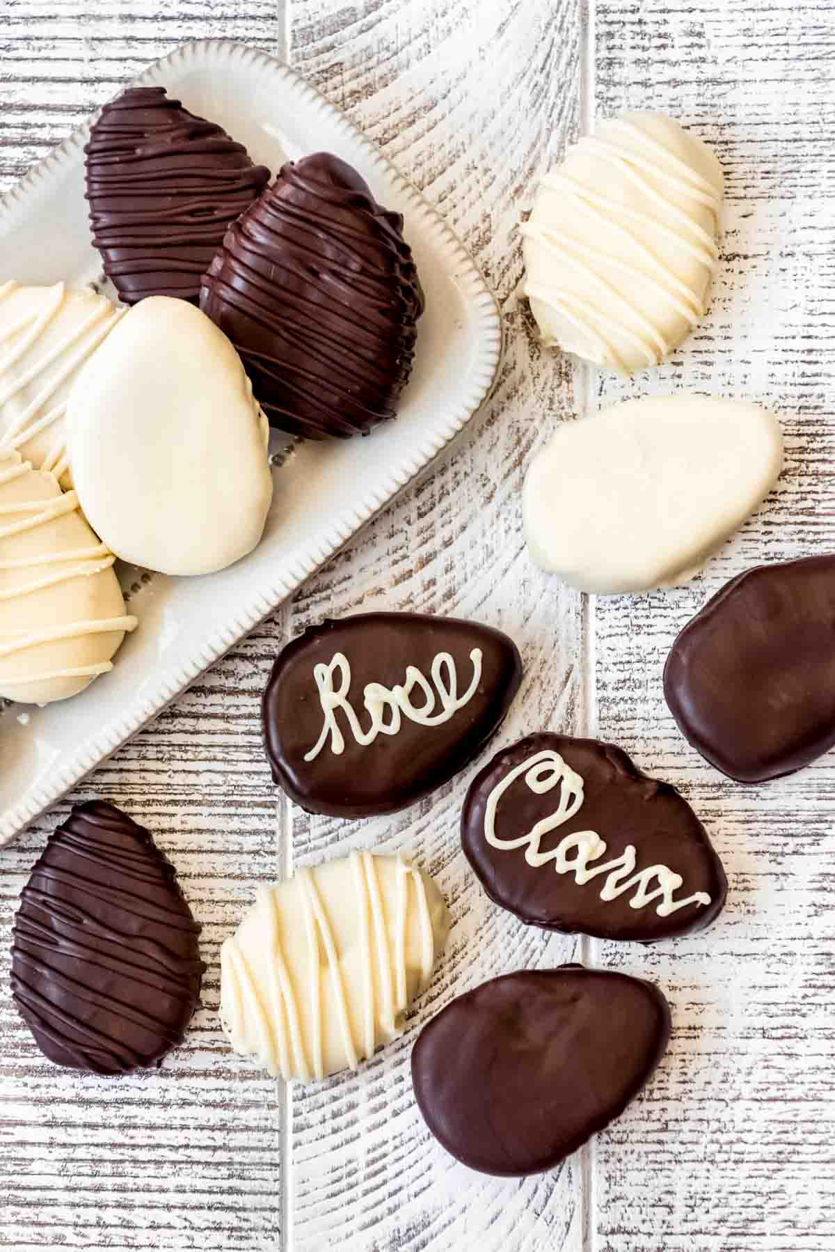 Decorated homemade peanut butter eggs with names on them.