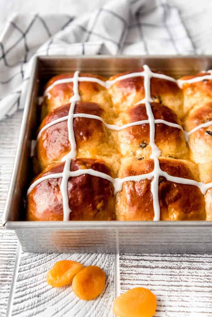 side view of Easter hot cross buns in a pan