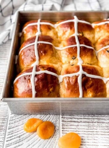 side view of Easter hot cross buns in a pan