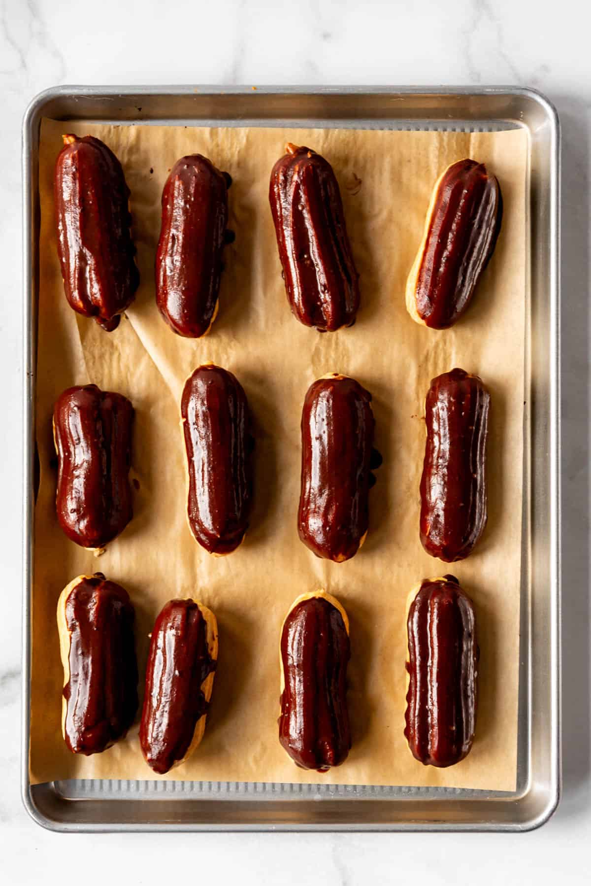 An overhead image of homemade chocolate eclairs.