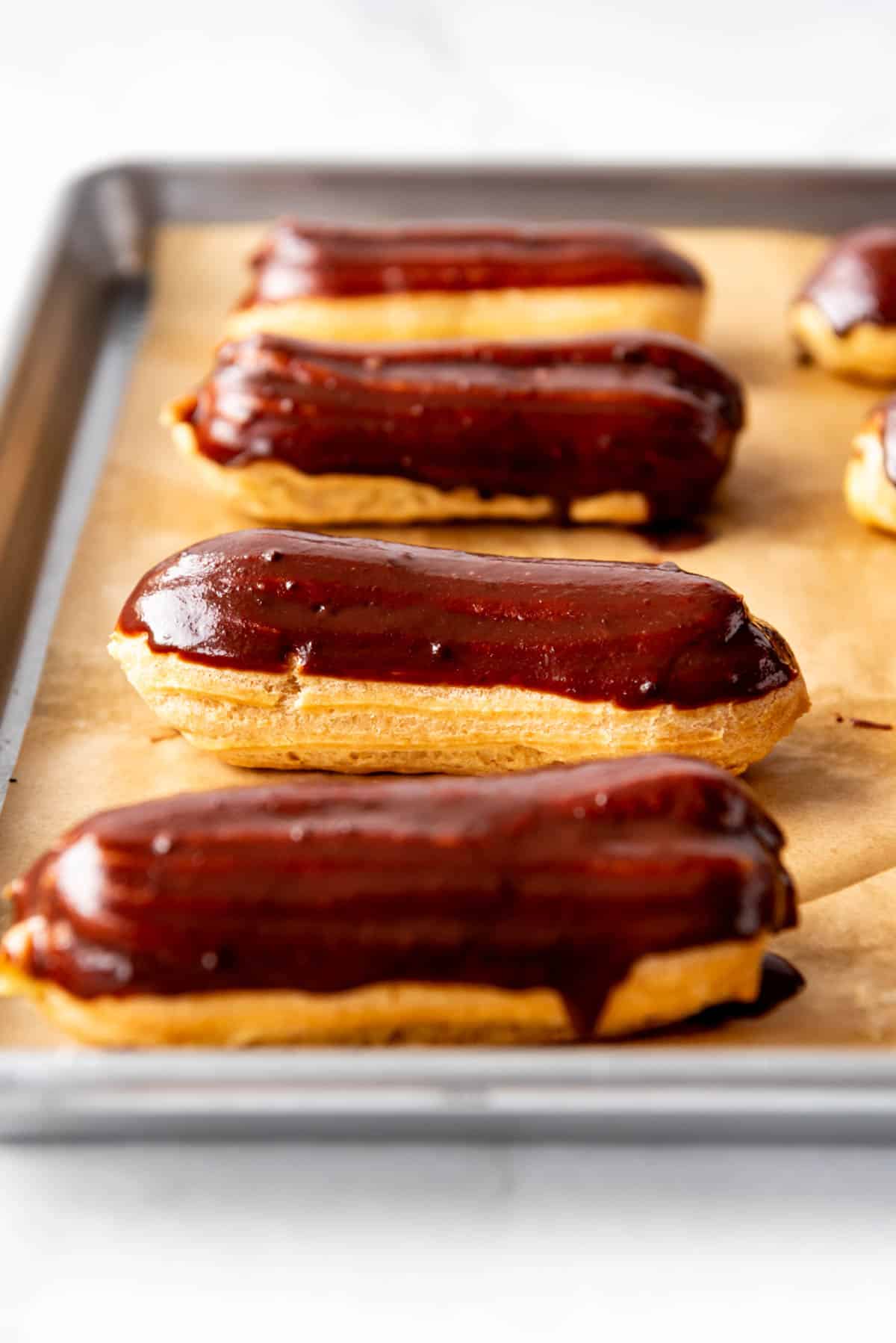 eclairs covered in chocolate ganache