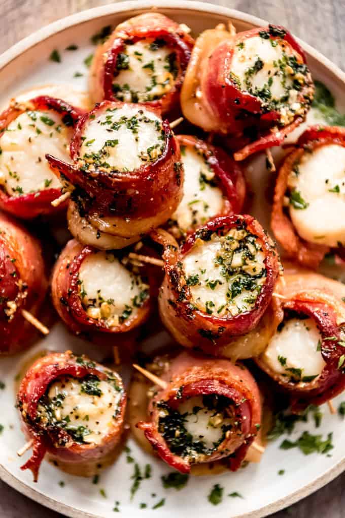 Bacon Wrapped Scallops baked with a brown sugar, butter, and herb glaze held together with a toothpick
