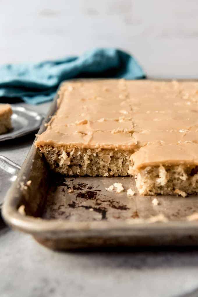 a side image of banana sheet cake covered in penuche frosting